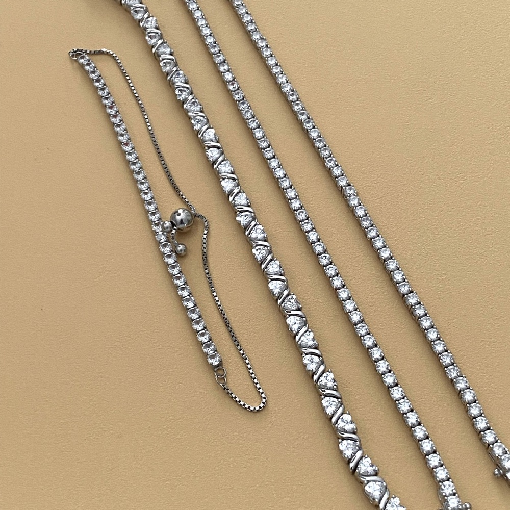 Set of 4 CZ in Sterling silver tennis bracelets. Like new